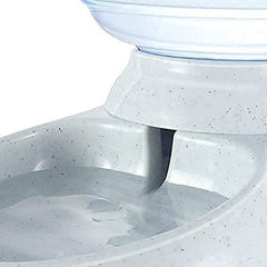 Automatic pet water and food dispenser, angled view with bowl
