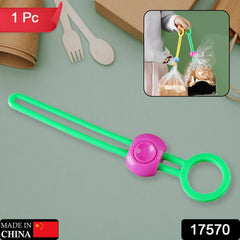 Close-up of food bag sealing clip securing chip bag