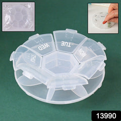 Pill organizer with seven compartments labeled for days of the week
