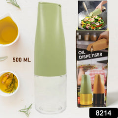 Close-up of oil dispenser non-drip spout pouring oil