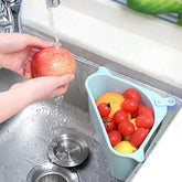 Triangular multi-functional sink drainer shelf in use