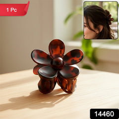 Close-up of hair claw clip showing floral design