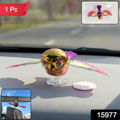 Colorful bird showpiece for vehicle interior