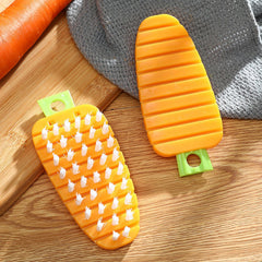 Vegetable scrubber held over fresh produce