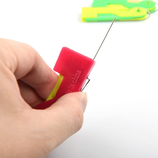 Automatic Needle Threading Device in multicolor on white background