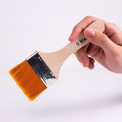Plastic curved handle of flat paint brush for better grip