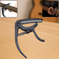 Wagtail Guitar Capo with pickup stand on white background