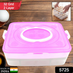 Person holding the portable 32-grid egg tray by its handle