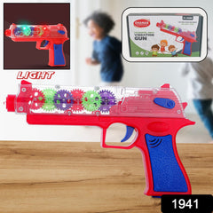 Child playing with the transparent gear laser toy gun