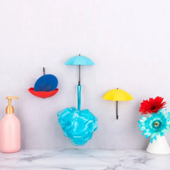 Close-up of umbrella wall hook with small storage compartment