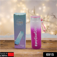Glass water bottle with rubber band for grip
