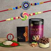 (K2_525+526_AS) Multicolor OM & Lord Ganpati Colorful Beads Rakhis Combo with Assorted Chocolate Dry fruits 96gm, Silver Color Pooja Coin, Roli Chawal & Greeting Card, Occasion, Rakhi for brother with gift, chocolate gift pack, rakhi with Ch