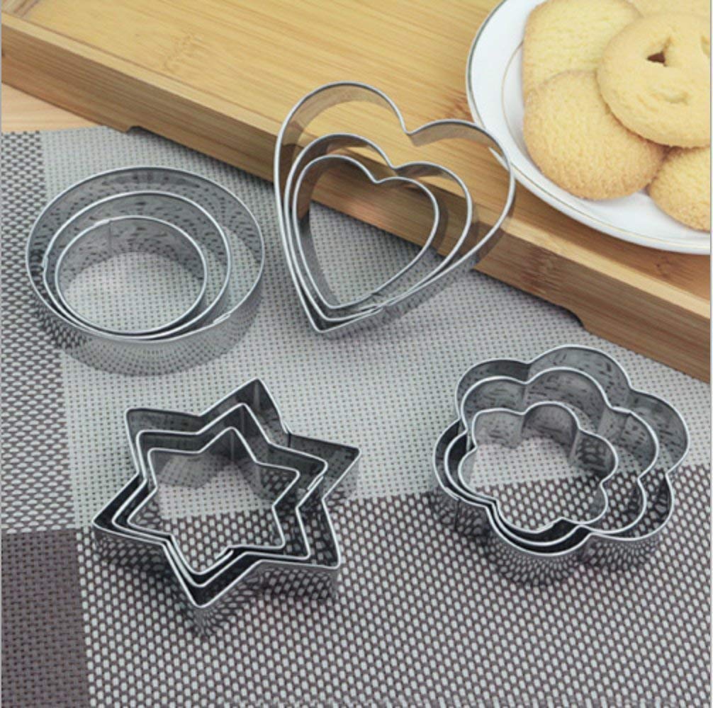 Set of stainless steel cookie cutters in heart, star, round, and flower shapes
