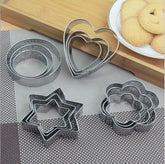 Set of stainless steel cookie cutters in heart, star, round, and flower shapes