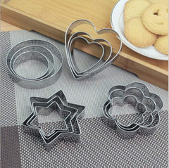 Set of stainless steel cookie cutters in heart, star, round, and flower shapes