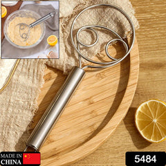 Close-up of stainless steel coil whisk for dough mixing