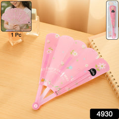 Foldable Hand Fan opened showing floral design