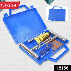 Close-up of tire repair strings and insertion tools