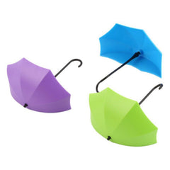 Umbrella wall hook holding bathroom and kitchen items