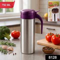 Oil dispenser with handle
