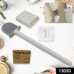 Close-up of bendable silicone brush head cleaning toilet