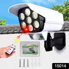 Camera shaped dummy wall lamp with solar panel