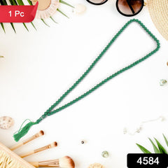 Close-up of 99-bead Islamic tasbih with separator