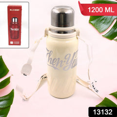 Water bottle with hanging strap and handle
