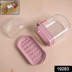Pink soap dish with clear dust shield lid protecting soap