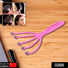 Close-up of metal ball heads on scalp massager
