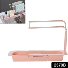 Expandable sink caddy showing dual towel bars and drip tray
