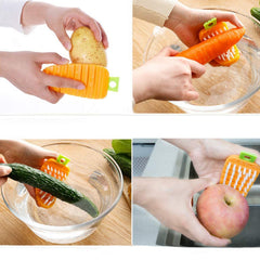 Carrot-shaped brush hanging by hole on kitchen hook