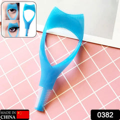 Close-up of eyelash tool showing mascara guard in use