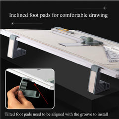 The underside of the drawing board shows an inclined foot pad, with an inset image of a hand installing it.
