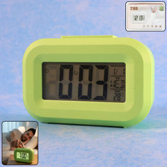 Digital alarm clock showing time, date, day and temperature