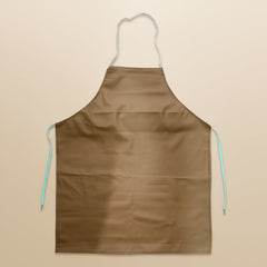 Kitchen apron worn during cooking tasks