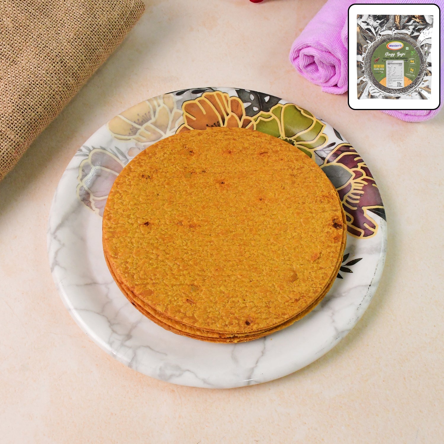Crispy Bajri Khakhra with ginger garlic flavor, showcasing its golden texture.