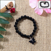 Premium beaded bracelet with butterfly charm on wrist