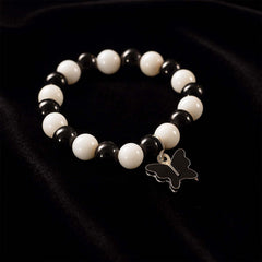 Close-up view of black and white beaded bracelet