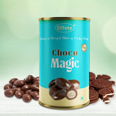A teal and gold snack can with chocolate balls and chocolate sandwich cookies scattered around its base. One ball is split
