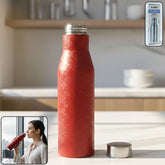 Red stainless steel water bottle with screw cap