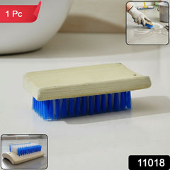 Scrub brush with hard bristles and wooden grip