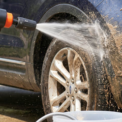 Portable car washer with adjustable nozzle and foam bottle for versatile cleaning.