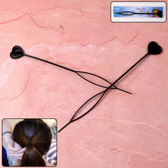 Two black heart-shaped hairpins on white background