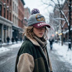 Winter woolen baseball cap with pom pom