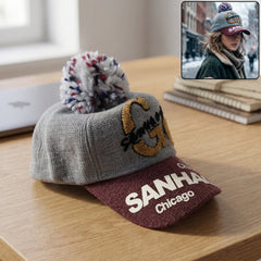 Women's woolen baseball cap with pom pom front view