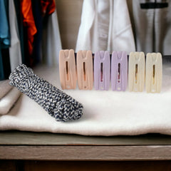 Cloth drying rope with clips hanging clothes outdoors