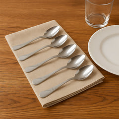 Elegant stainless steel dining spoons with engraved handles