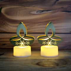 Golden diya LED tealight candles arranged for decoration