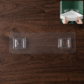 Adhesive plastic wall hook